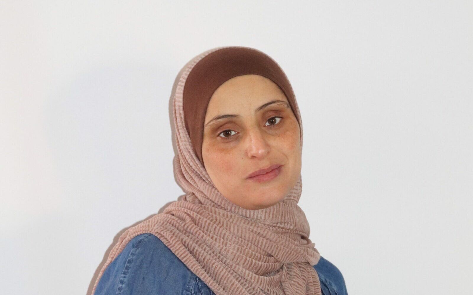 Eman, a bereaved mother who found hope between lines of pain!